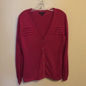 Magenta/ reddish colored cardigan